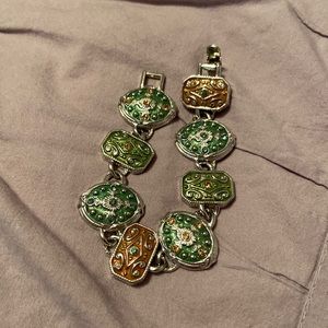 Liz put lots of details on this 7 1/2 in mostly greens bracelet.